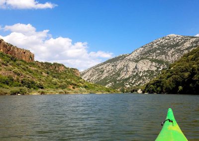 guided canoeing kayaking tours local guide Sardinia families family kids children beginners lake sea