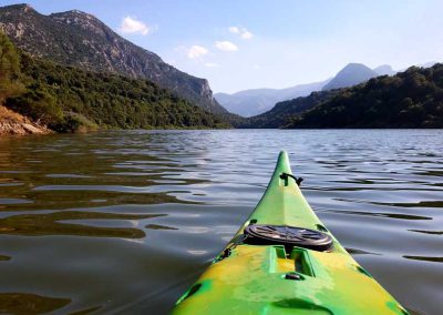 guided canoeing kayaking family kids children beginners lake tours local guide Sardinia families